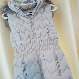 Bebe Zip up Vest with Faux Fur.